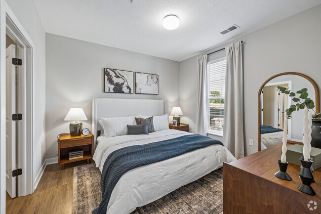 1BR, 1BA - 722SF - Primary Bedroom - Carriage Park