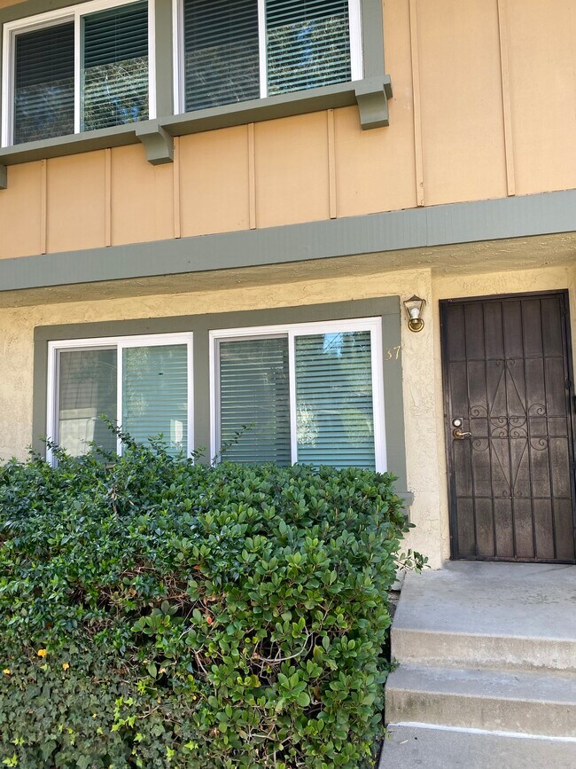 Front Entry - Showing New Windows - 6635 Wilbur Ave Townhome