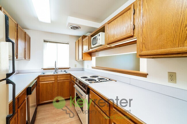 Photo - **Rent Special** Remodeled Two-Bedroom with Open Floor Plan, Parking, and Easy Transit Access