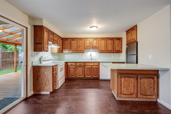 Photo - Expansive Backyard, Gardening Space & Comfortable Single-Level Living