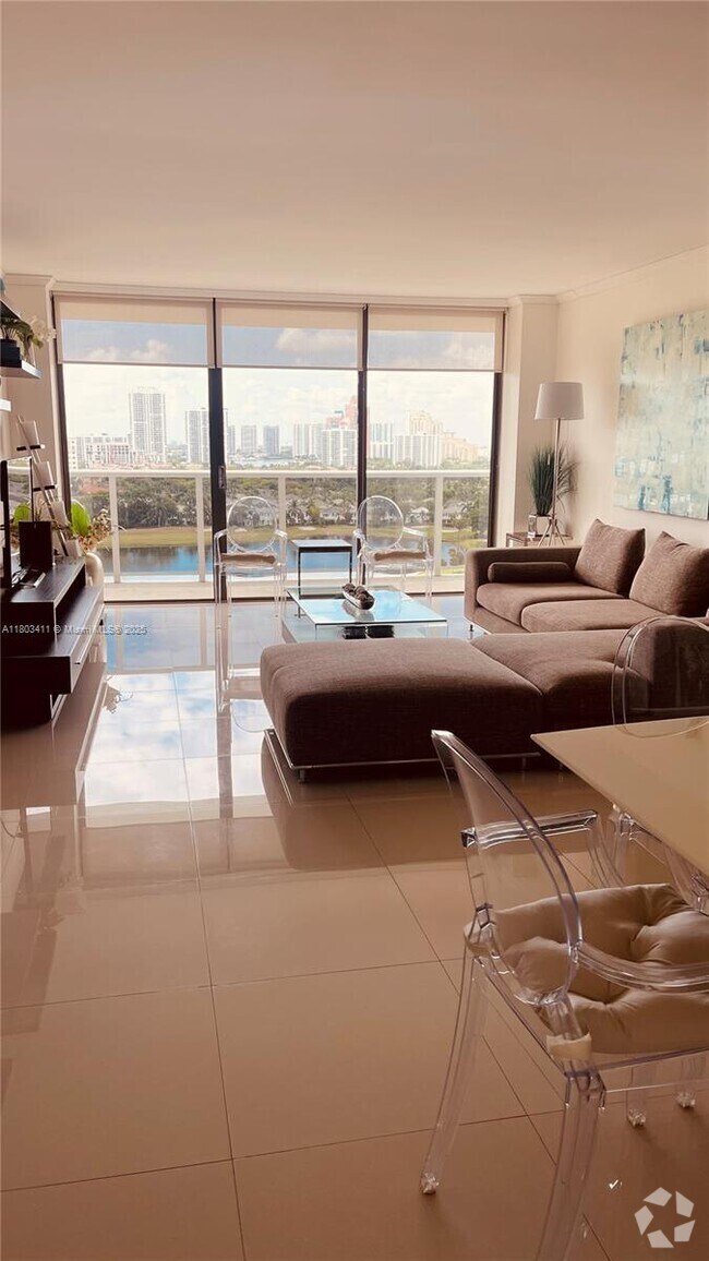 Building Photo - 3675 N Country Club Dr Unit 1706 Rental