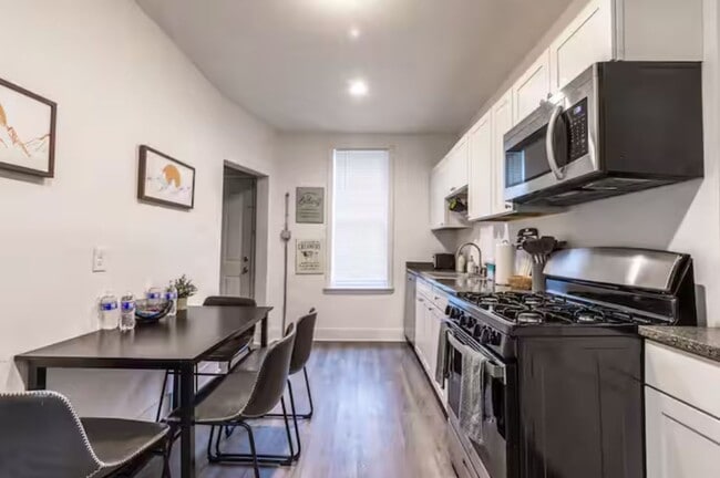 Photo - Renovated 3BR in South Side Flats | 100 Walk Score | In-Unit Laundry