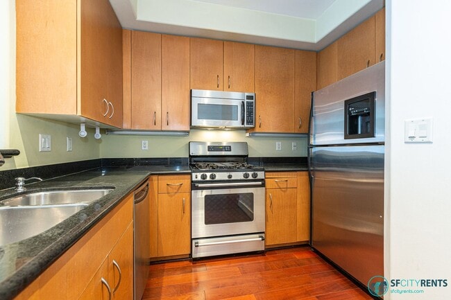 Photo - Downtown/Civic Center: Condo near Hayes Valley w/ Private Patio, Google Fiber & Garage Parking Unit 851 Van Ness Ave. #202
