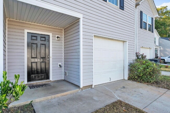Photo - Stylish 3BR, 2.5BA Townhome with Loft and ...