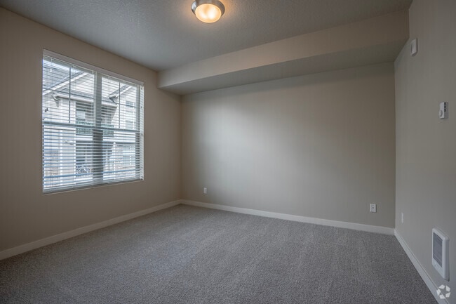 2BR, 2BA - 1056SF Primary Bedroom