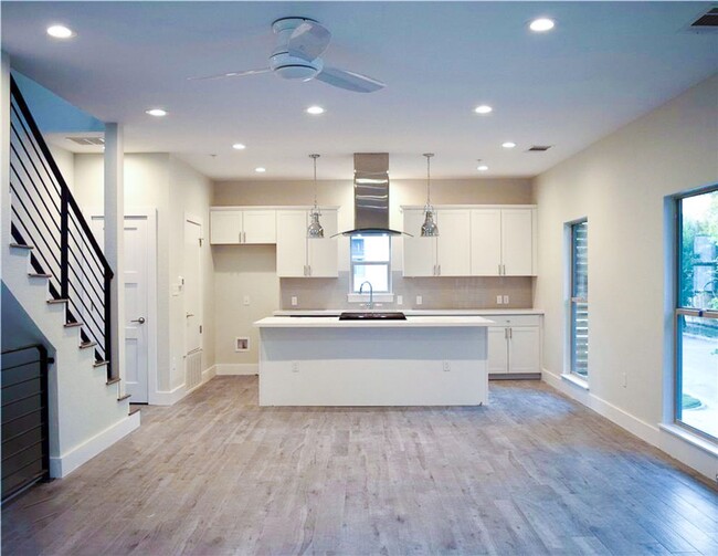 Building Photo - Modern Newer Townhome Across Frm UT