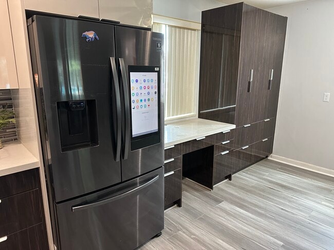 Work desk a joining the kitchen. - 8930 SW 149th Ter