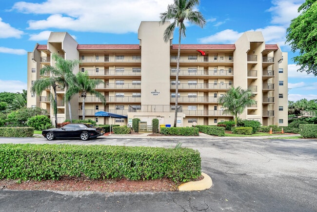 Building Photo - 3524 Via Poinciana Unit 604