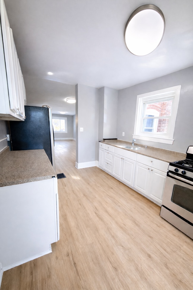 Photo - Beautifully Modern 3BR Townhome | Finished Basement | Fenced Yard | Baltimore
