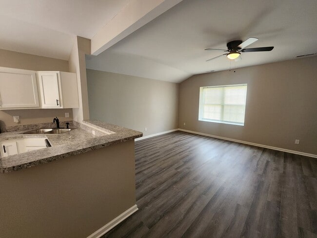 Photo - Renovated 2 bedroom 1 bath duplex unit with updated floors, bath, and kitchen!!
