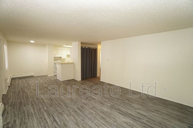 Building Photo - 2225 S Jasmine St Unit #116