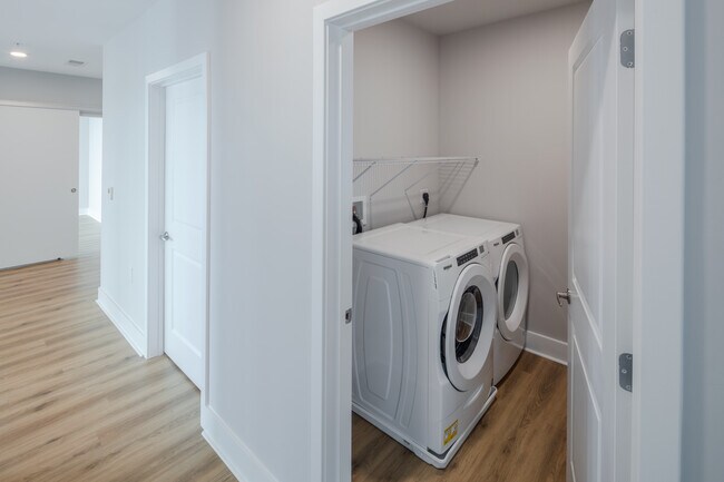 Penthouse-level Signature Collection apartment homes with side-by-side washer and dryer