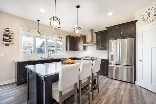 Photo - Spacious 4-Bedroom Gem with Modern Comforts and Finished Basement in Vadnais Heights!