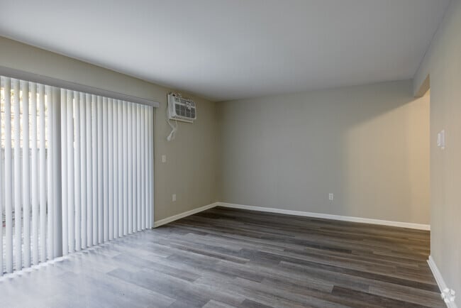 The Coffey - Living and Dining Room - Wade Manor
