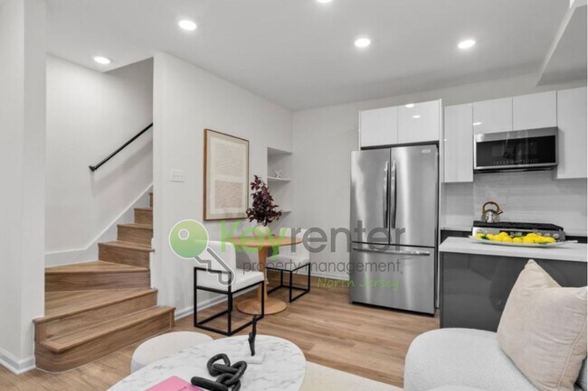 Photo - Rare Renovated 3BR/2BA Townhouse with Private Yard & NYC Views