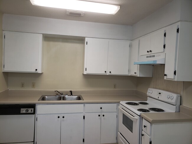 Kitchen updated with newly refinished cabinets and newly painted counter tops - 32A 5th St Unit 32 A 5th St