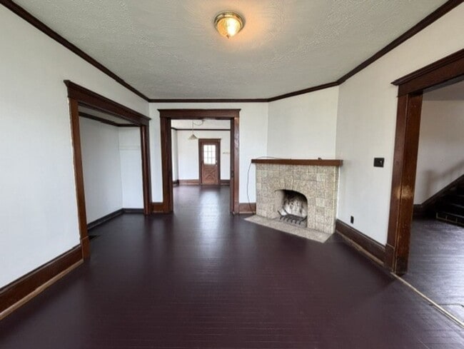 Photo - Spacious 4-Bedroom Home with 2 Full Baths, Central A/C & Fenced Yard!