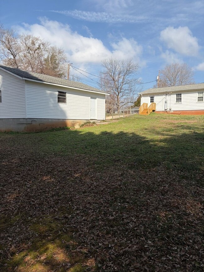 Photo - FENCED IN YARD AND LARGE DETACHED TWO CAR GARAGE LOCATED IN THE DESIRED TRAVELERS REST!!!
