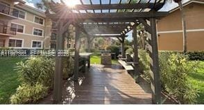 Building Photo - 8741 Wiles Rd Unit 208