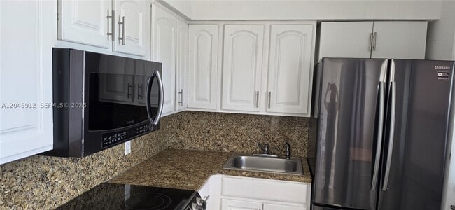 Building Photo - 20201 NE 29th Ct Unit D336