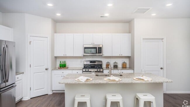 Building Photo - 407 Ladyfish Loop NW Rental