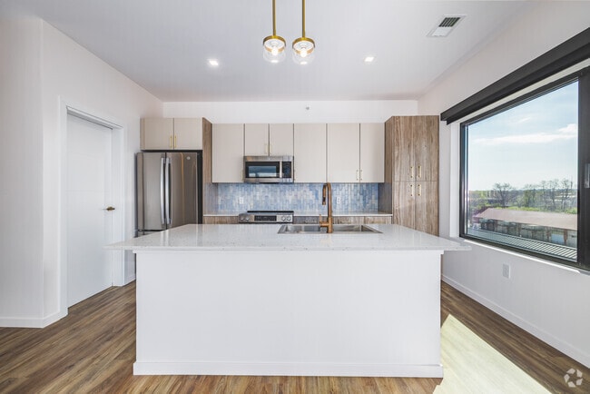 2BR, 2BA - 1,058SF - Kitchen - Webster Station Flats