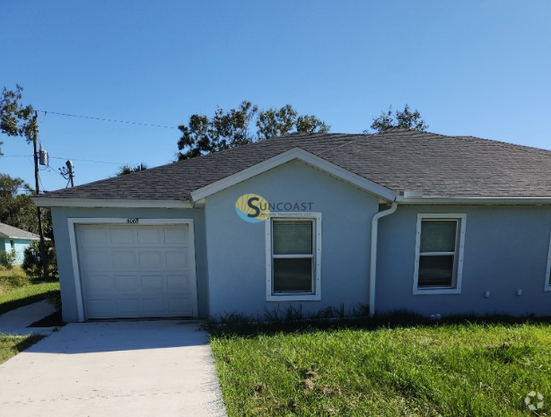 Building Photo - BEAUTIFUL DUPLEX  WITH GARAGE IN FT. MYERS Rental