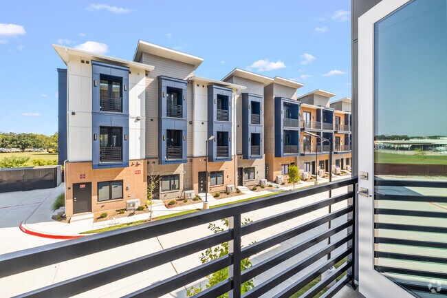 2BR, 2.5BA - 1,200SF - Living Room Balcony