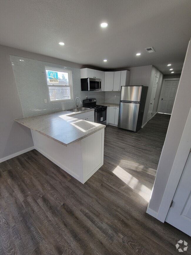 Building Photo - 2417 East 13th Street Unit Rear Rental