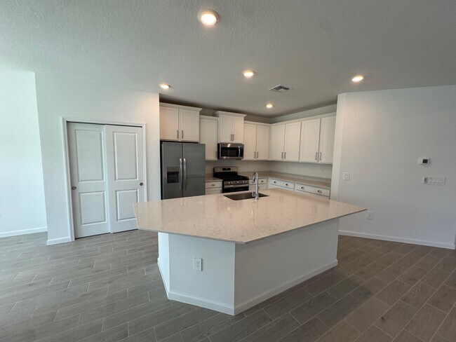 Photo - 13717 NW Convergence Blvd