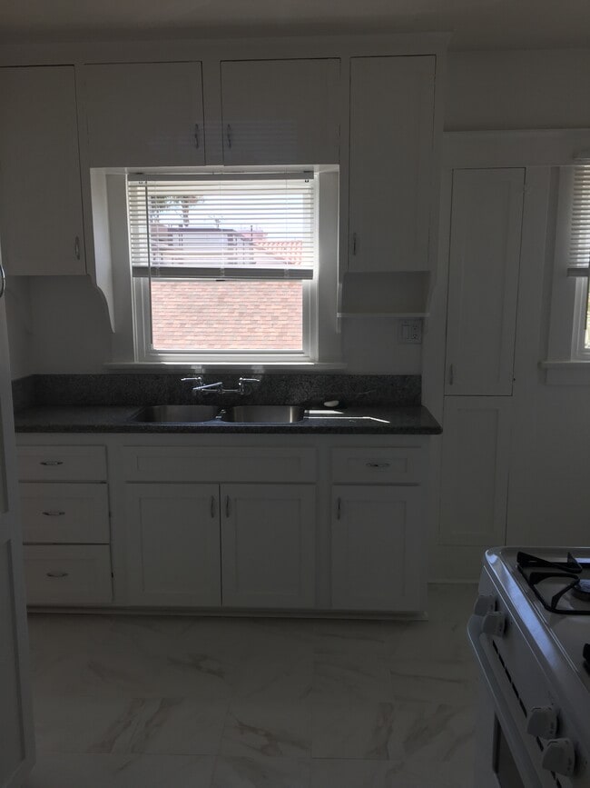 Kitchen from hallway - 3707 E 4th St Unit 3707