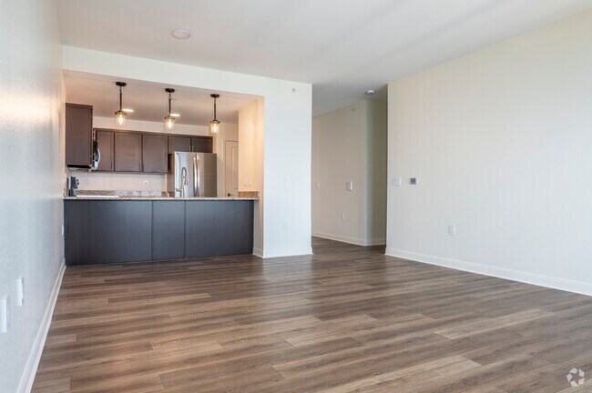 2BR, 2BA - 1,140SF - Living Room and Kitchen