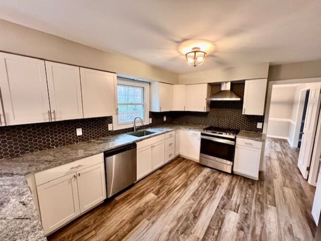 Photo - Colonial home with large yard