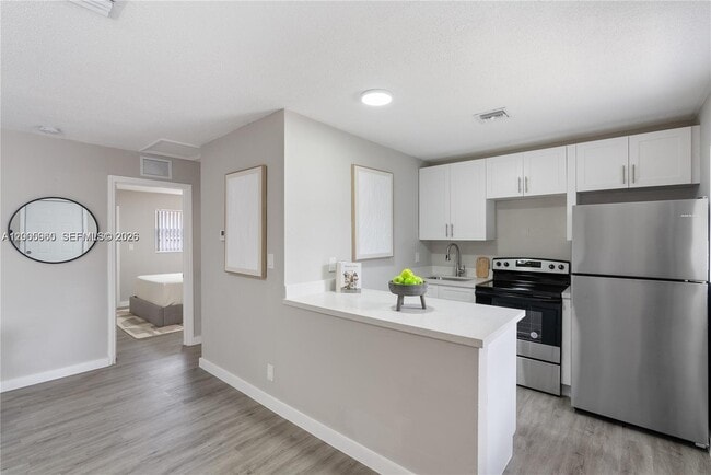 Building Photo - 452 SW 4th Ave Unit 6