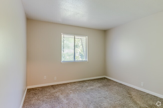 2BR, 1.5BA - First Bedroom - Versailles Apartments