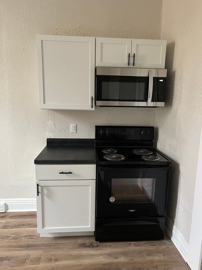 Photo - DOWNTOWN…. Utilities included Unit Apt. C