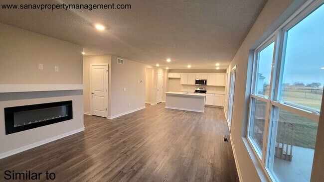 Photo - Contemporary Comfort: A Four-Bedroom Haven with Modern Flourish w/ 3 CAR GARAGE and a Fenced Back...