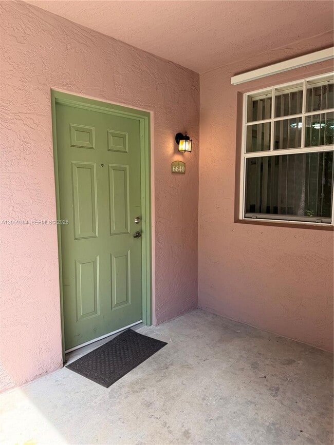 Building Photo - 6640 W Sample Rd Unit 6640