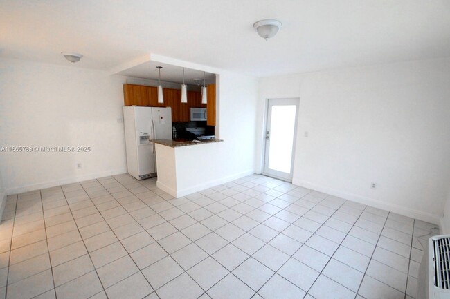 Building Photo - 7315 Byron Ave Unit 9 Rental