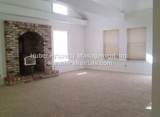 Photo - Bright Single-Story Home with Skylights, Wood Stove & Large Deck