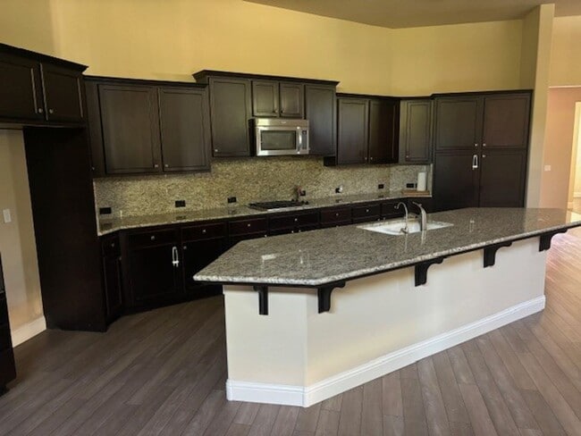 Photo - Elegant 4-Bedroom Home with Paid Solar in ...