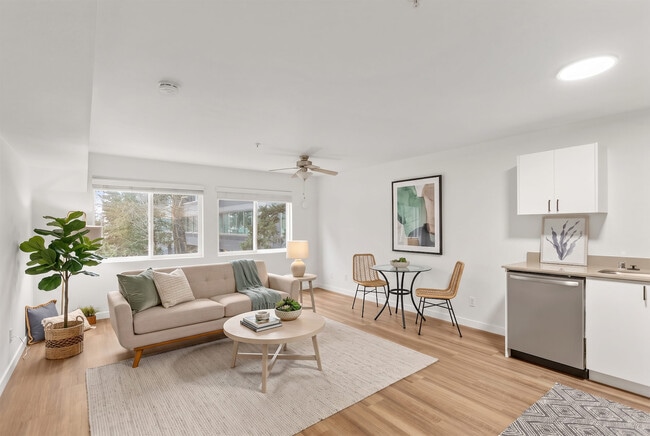A defined dining corner means you get a real table, not just a coffee table to eat over.