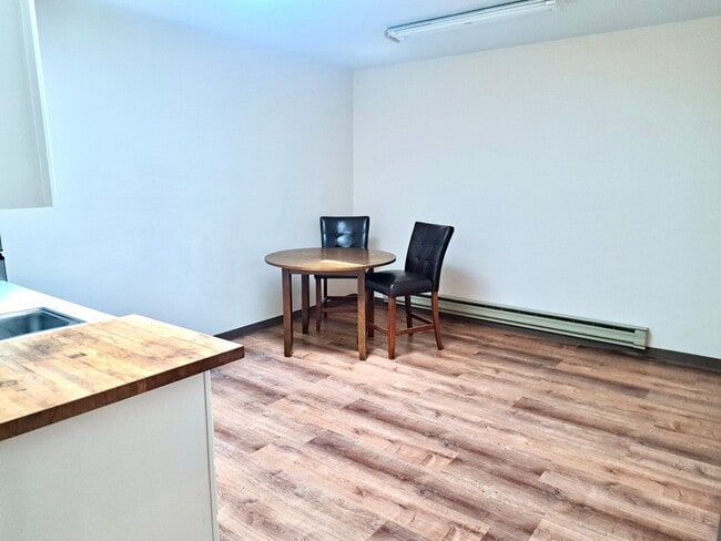 Photo - UNDER NEW MANAGEMENT: Accessible Studio w/ Laminate Floors! All-Inclusive "One Bill" Living, Free... Unit 3959 Sheridan Ave Apt 10