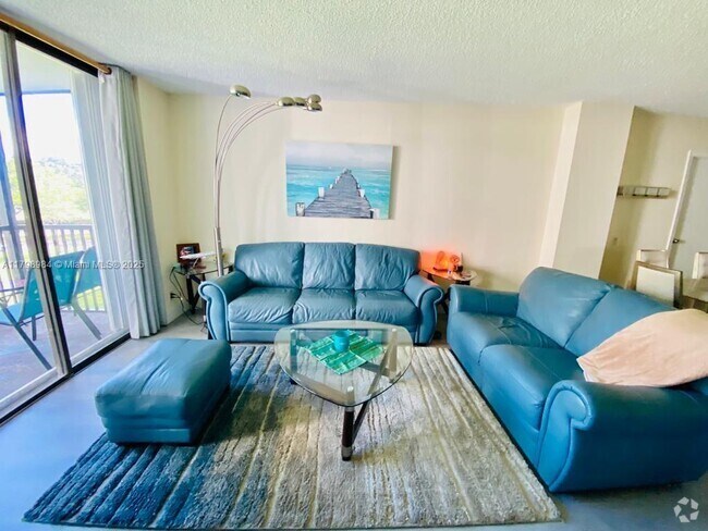 Building Photo - 3475 N Country Club Dr Unit 306 Rental