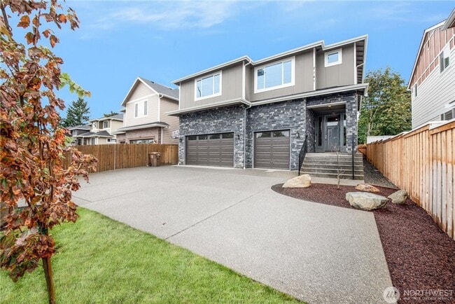 Building Photo - Luxury NW Living: 4 Bedroom Masterpiece with Dual Suites and Private Yard in Desirable Browns Point!