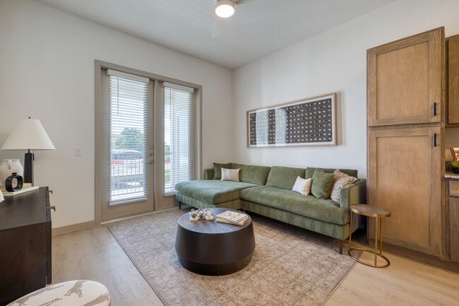 Spacious living room with an open, inviting layout at Residence at Pearsall Park