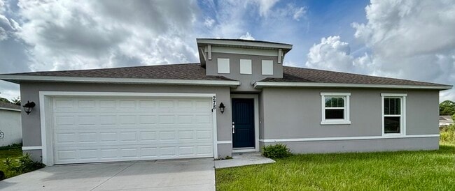 Building Photo - BEAUTIFUL 4/2 HOME IN PALM BAY