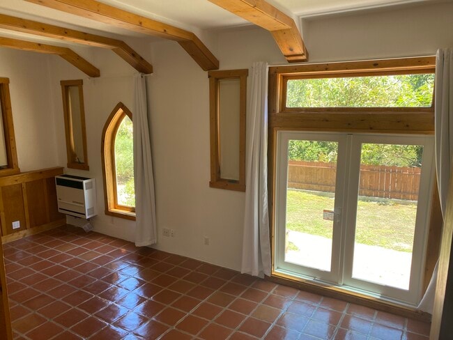 Vaulted ceilings and double front doors. - 6206 Temple Hill Dr Unit Lower