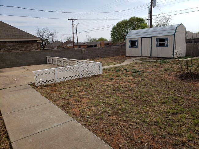 Back patio and shed - 703 NW 7th St