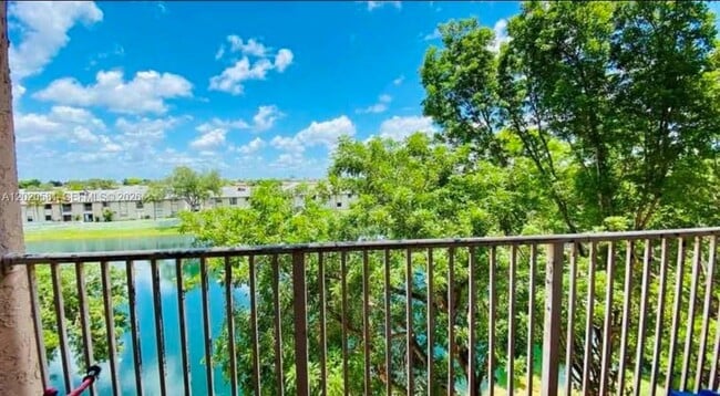 Building Photo - 15221 SW 80th St Unit 406